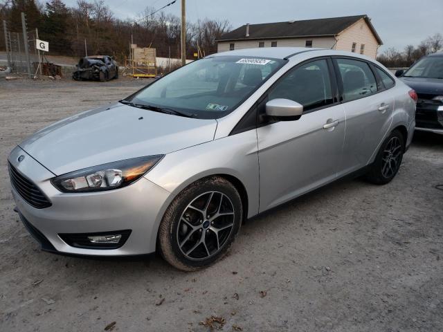 FORD FOCUS SE 2018 with VIN 1FADP3F26JL219722 - Photo from auction