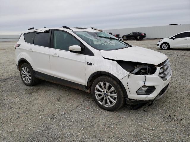 Photo 4 from auction – 2018 FORD ESCAPE TIT with VIN 1FMCU0J98JUA64677