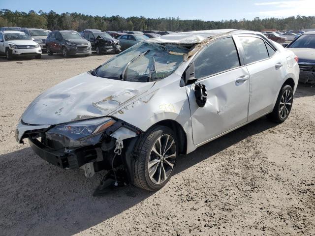 TOYOTA COROLLA L 2019 with VIN 5YFBURHEXKP898830 - Photo from auction