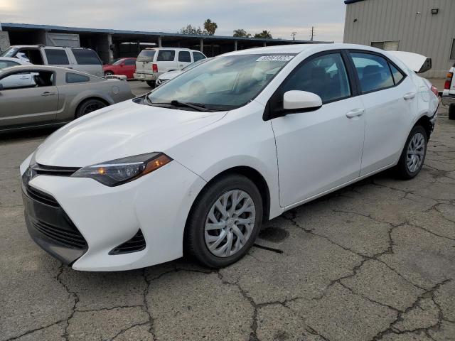 TOYOTA COROLLA L 2017 with VIN 2T1BURHE6HC861959 - Photo from auction