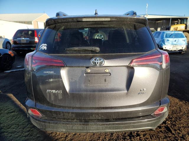Photo 6 from auction – 2018 TOYOTA RAV4 LE with VIN JTMBFREV6JJ217869