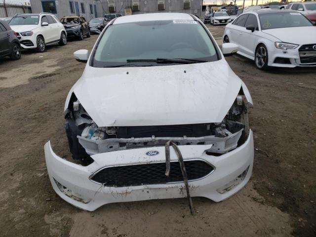 Photo 5 from auction – 2016 FORD FOCUS SE with VIN 1FADP3F27GL325587