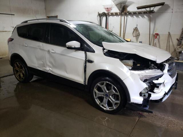 Photo 4 from auction – 2017 FORD ESCAPE TIT with VIN 1FMCU9J96HUA41879