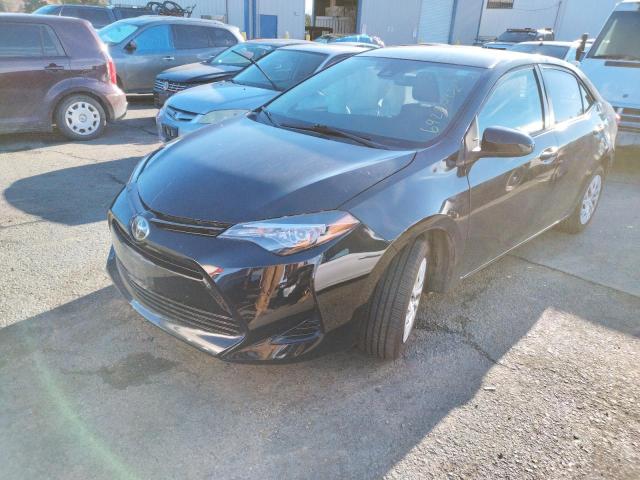 TOYOTA COROLLA L 2017 with VIN 2T1BURHEXHC772475 - Photo from auction