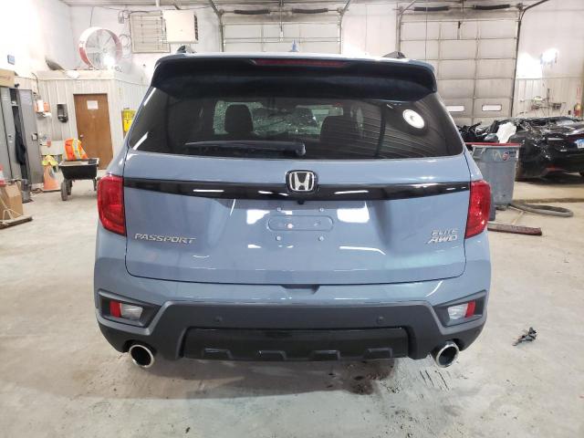 Photo 6 from auction – 2022 HONDA PASSPORT E with VIN 5FNYF8H05NB011959