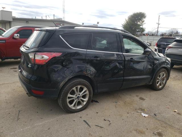 Photo 3 from auction – 2017 FORD ESCAPE SE with VIN 1FMCU9GD8HUC88560
