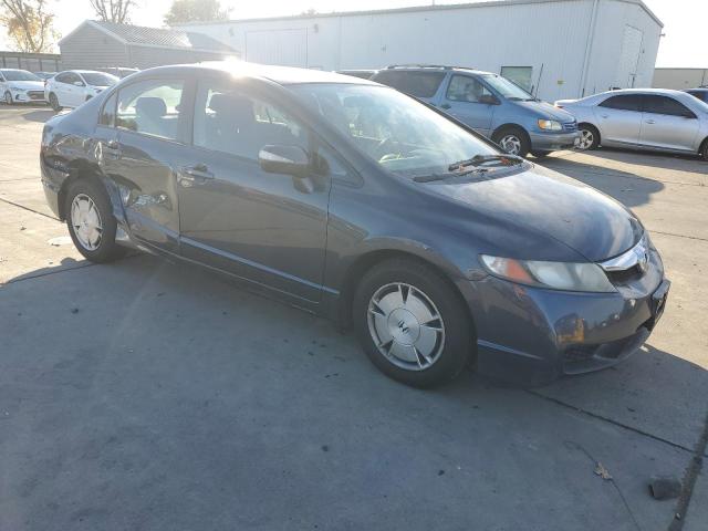 Photo 4 from auction – 2010 HONDA CIVIC HYBR with VIN JHMFA3F29AS004859