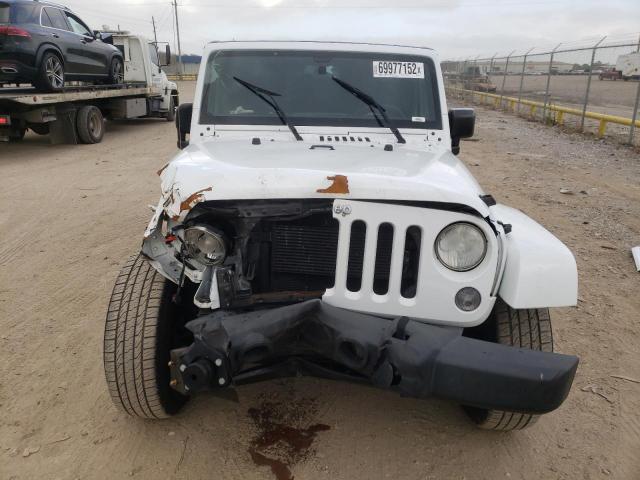 Photo 5 from auction – 2015 JEEP WRANGLER U with VIN 1C4BJWDG2FL523477