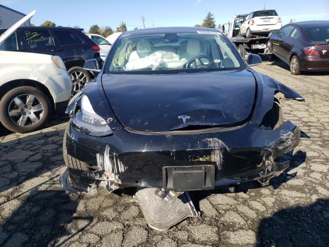 Photo 5 from auction – 2018 TESLA MODEL 3 with VIN 5YJ3E1EAXJF177969