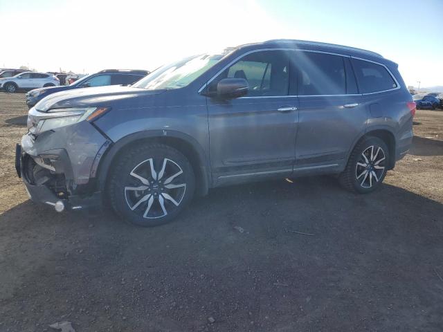 HONDA PILOT ELIT 2019 with VIN 5FNYF6H06KB063228 - Photo from auction