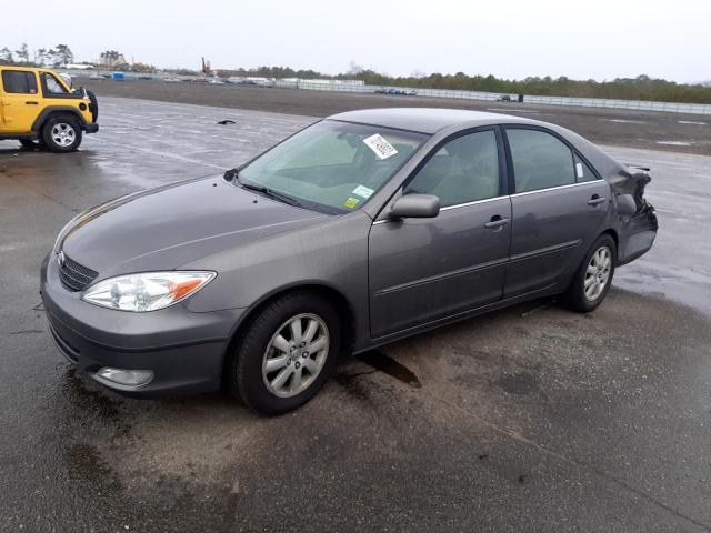 TOYOTA CAMRY LE 2003 with VIN 4T1BE30K13U659632 - Photo from auction
