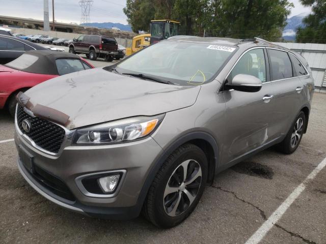 KIA SORENTO EX 2016 with VIN 5XYPH4A18GG149864 - Photo from auction