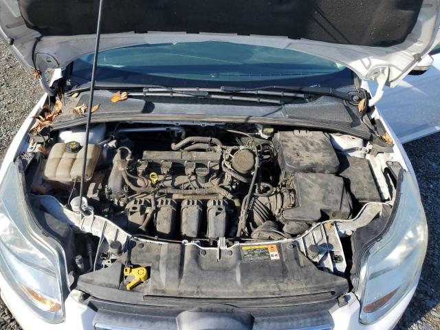 Photo 11 from auction – 2014 FORD FOCUS SE with VIN 1FADP3F27EL131638