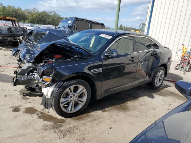FORD TAURUS SEL 2014 with VIN 1FAHP2E89EG184643 - Photo from auction