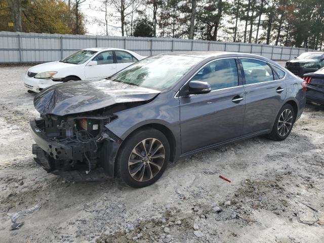 TOYOTA AVALON XLE 2016 with VIN 4T1BK1EB0GU209370 - Photo from auction