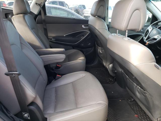 Photo 11 from auction – 2016 HYUNDAI SANTA FE S with VIN KM8SRDHF2GU138216