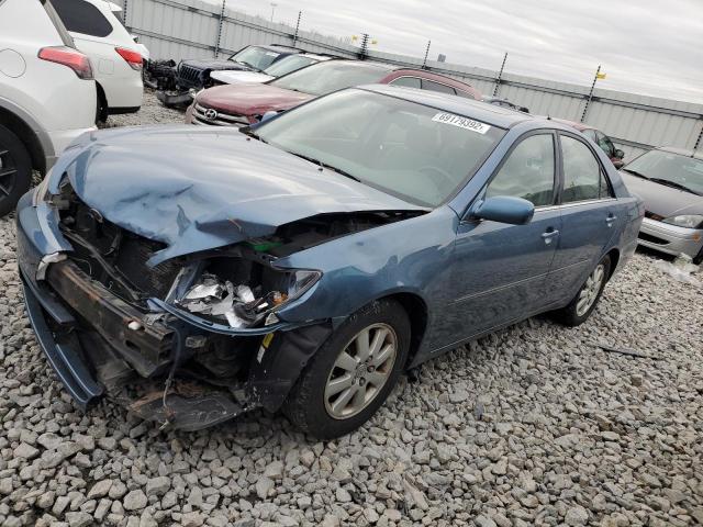 TOYOTA CAMRY LE 2004 with VIN 4T1BF32K44U577017 - Photo from auction
