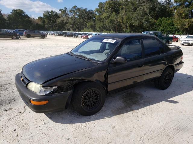 TOYOTA COROLLA DX 1997 with VIN 1NXBB02EXVZ595253 - Photo from auction