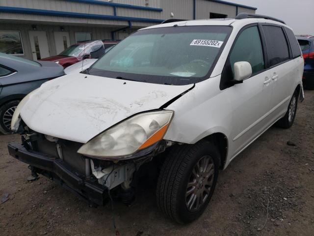 TOYOTA SIENNA XLE 2010 with VIN 5TDYK4CC7AS301129 - Photo from auction