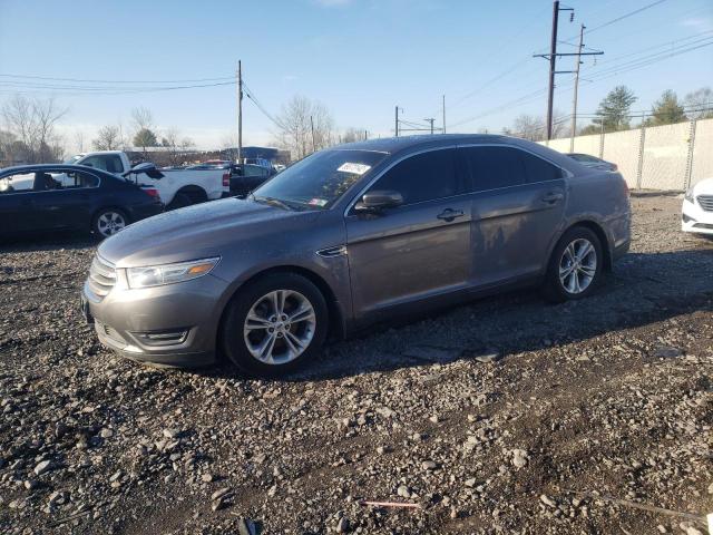 FORD TAURUS SEL 2013 with VIN 1FAHP2E98DG214948 - Photo from auction