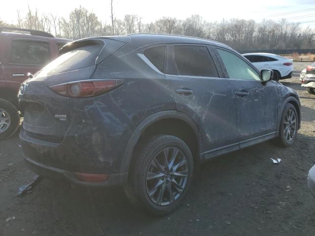 Photo 3 from auction – 2021 MAZDA CX-5 SIGNA with VIN JM3KFBEY3M0356991