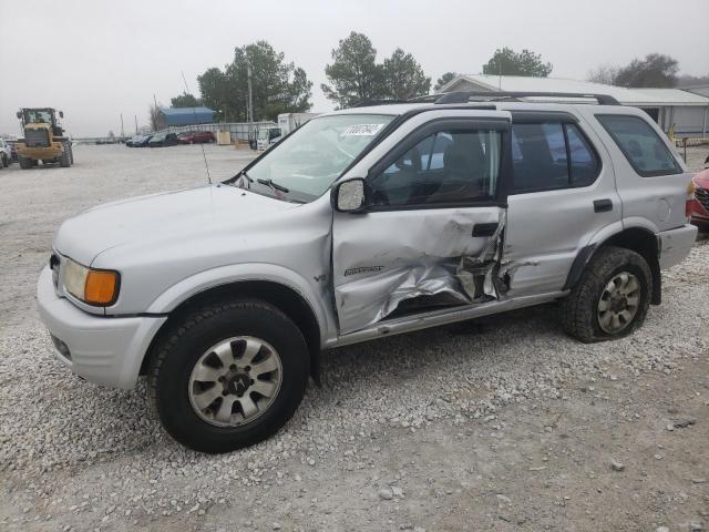 HONDA PASSPORT E 1999 with VIN 4S6CM58W2X4419352 - Photo from auction