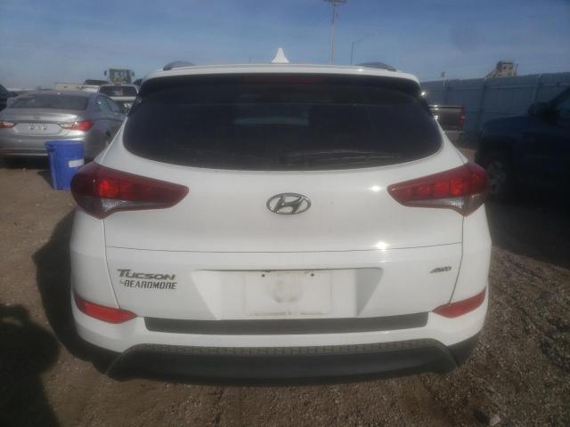 Photo 6 from auction – 2018 HYUNDAI TUCSON SEL with VIN KM8J3CA42JU613290