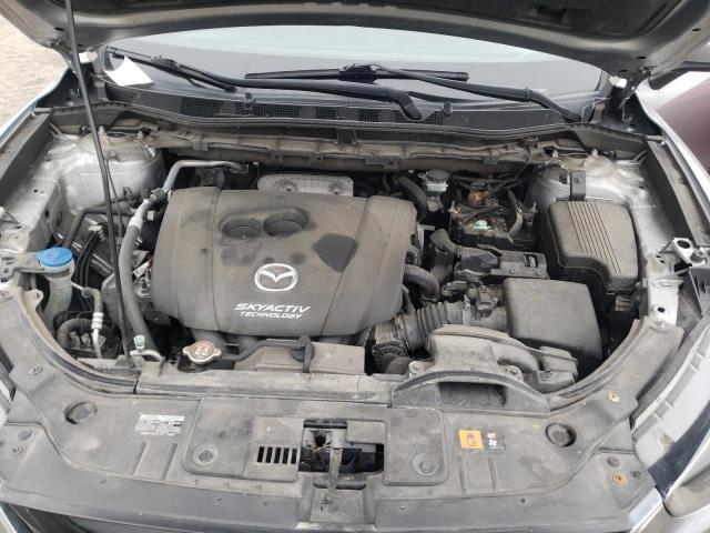 Photo 12 from auction – 2014 MAZDA CX-5 SPORT with VIN JM3KE2BE2E0404074