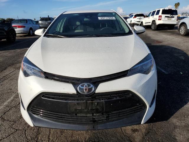 Photo 5 from auction – 2017 TOYOTA COROLLA LE with VIN 5YFBPRHE9HP667613