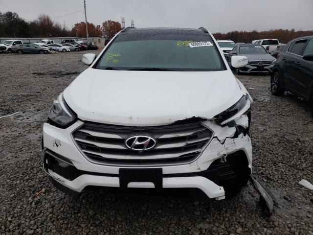 Photo 5 from auction – 2017 HYUNDAI SANTA FE S with VIN 5NMZU3LB4HH040975