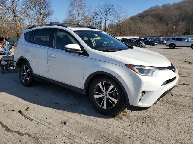 Photo 4 from auction – 2017 TOYOTA RAV4 XLE with VIN JTMRFREV0HD211346