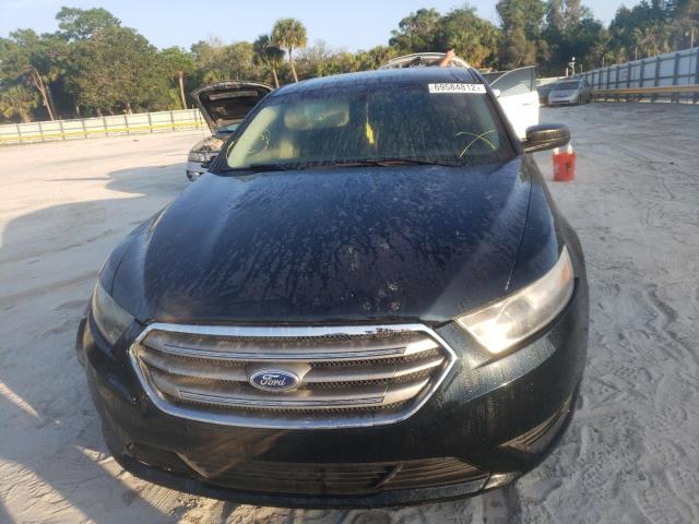 Photo 5 from auction – 2014 FORD TAURUS SE with VIN 1FAHP2D85EG138339