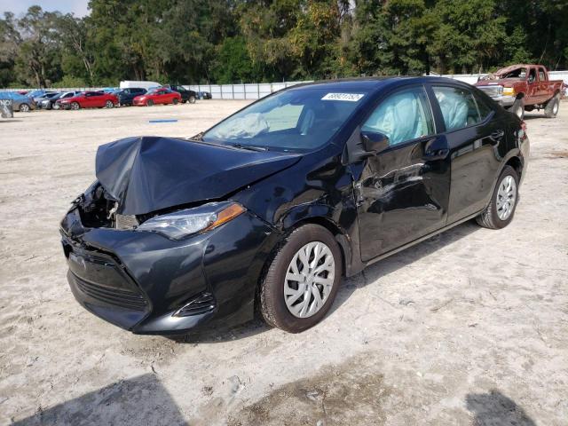 TOYOTA COROLLA L 2019 with VIN 5YFBURHE7KP856258 - Photo from auction