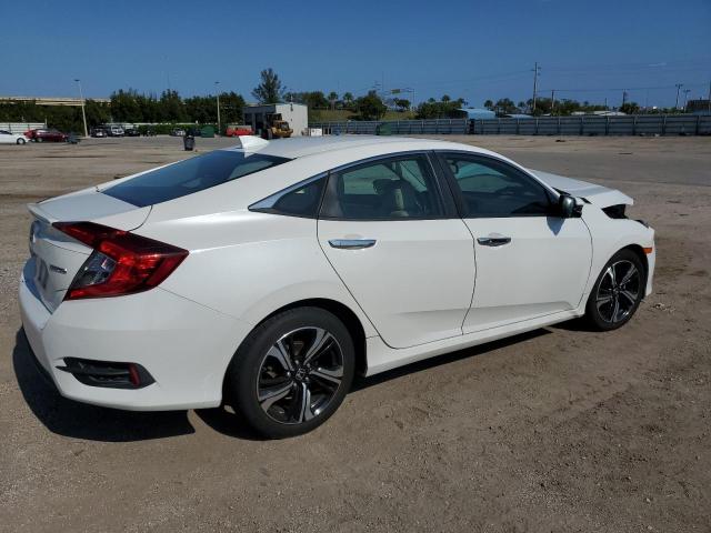 Photo 3 from auction – 2016 HONDA CIVIC TOUR with VIN 19XFC1F98GE026313