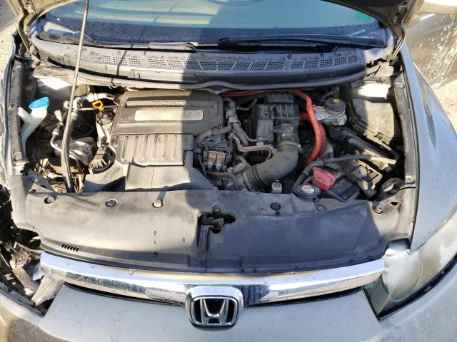 Photo 11 from auction – 2006 HONDA CIVIC HYBR with VIN JHMFA36256S021410