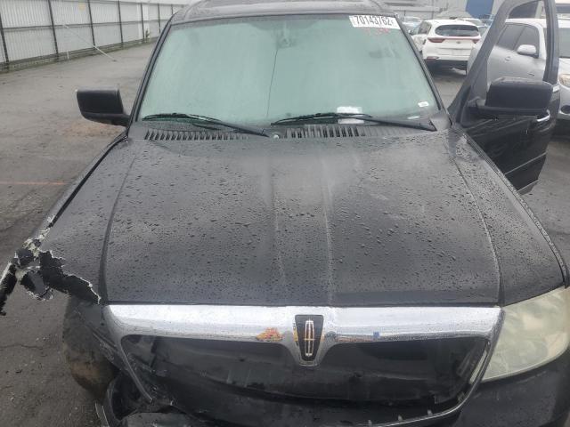 Photo 12 from auction – 2004 LINCOLN NAVIGATOR with VIN 5LMFU27R24LJ39090