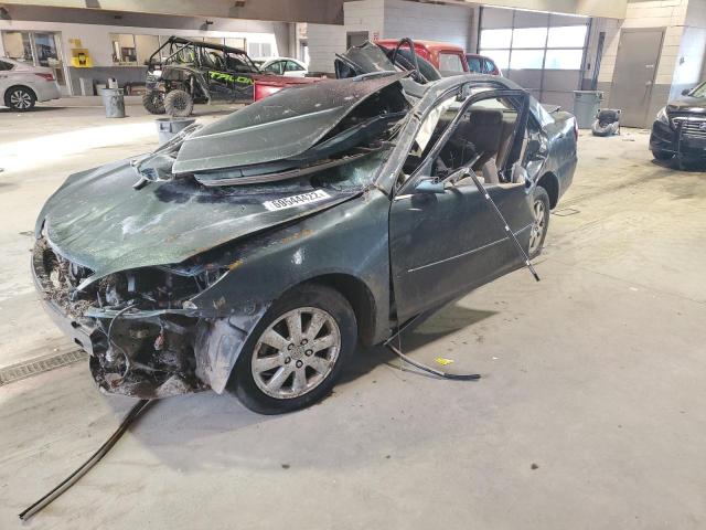 TOYOTA CAMRY LE 2003 with VIN 4T1BF30K63U554257 - Photo from auction