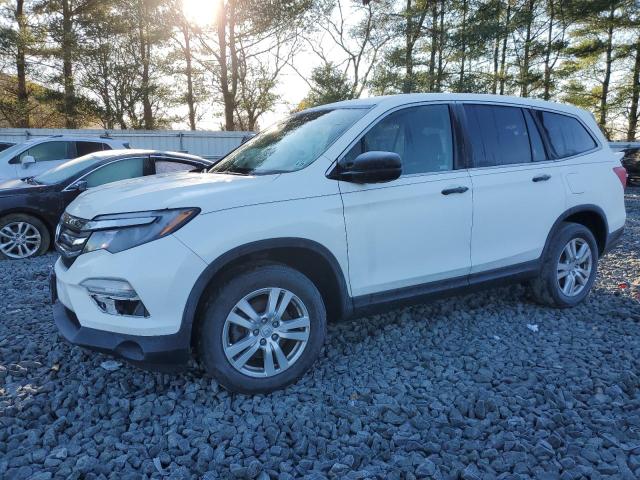 HONDA PILOT LX 2018 with VIN 5FNYF6H10JB051888 - Photo from auction