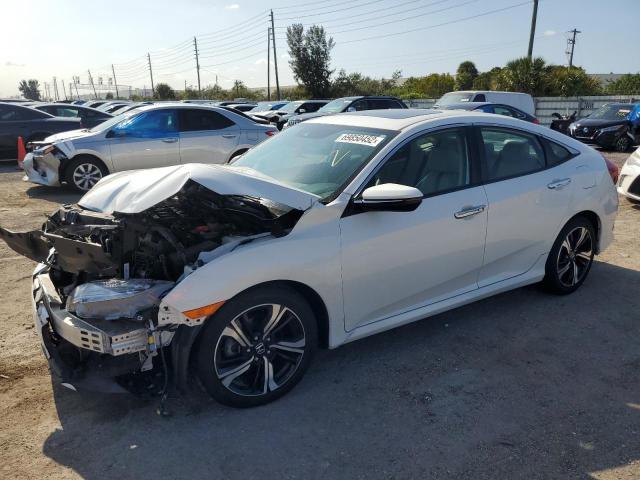 HONDA CIVIC TOUR 2016 with VIN 19XFC1F98GE026313 - Photo from auction
