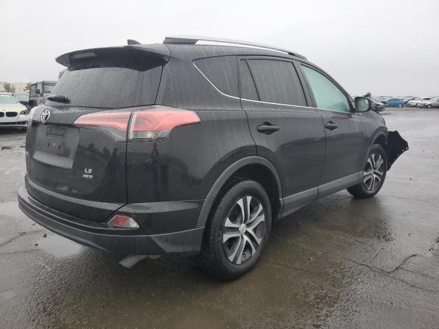 Photo 3 from auction – 2016 TOYOTA RAV4 LE with VIN 2T3BFREV2GW533327