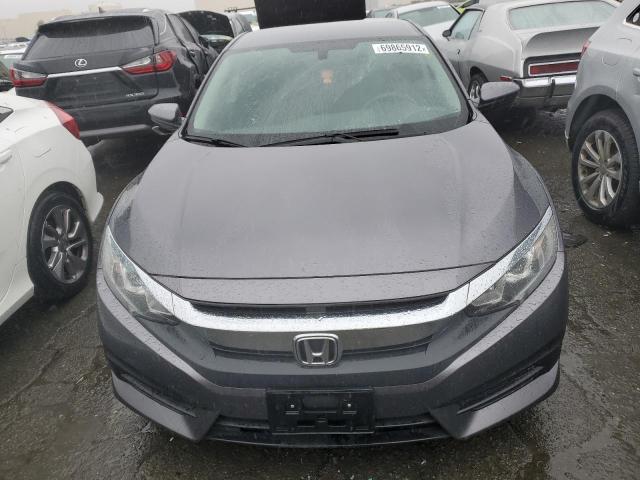 Photo 5 from auction – 2017 HONDA CIVIC LX with VIN 19XFC2F54HE224438