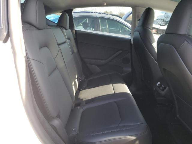 Photo 11 from auction – 2022 TESLA MODEL Y with VIN 7SAYGDEE3NA010086