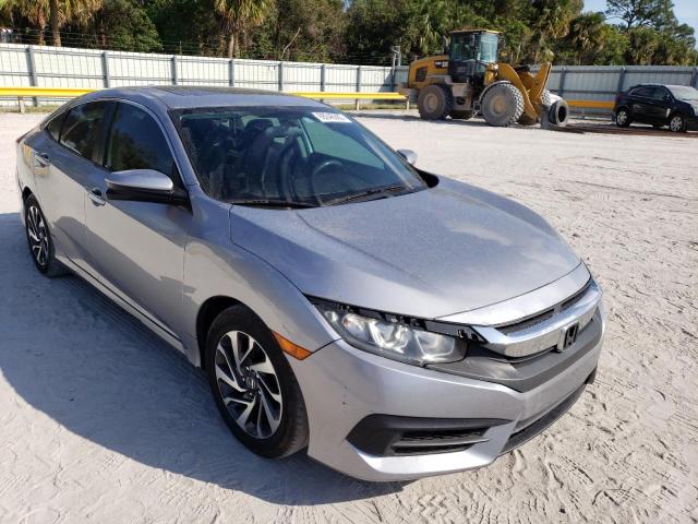 Photo 4 from auction – 2018 HONDA CIVIC EX with VIN 19XFC2F70JE002745