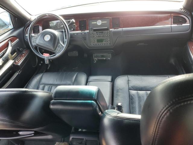 Photo 8 from auction – 2004 LINCOLN TOWN CAR E with VIN 1L1FM81W84Y646990