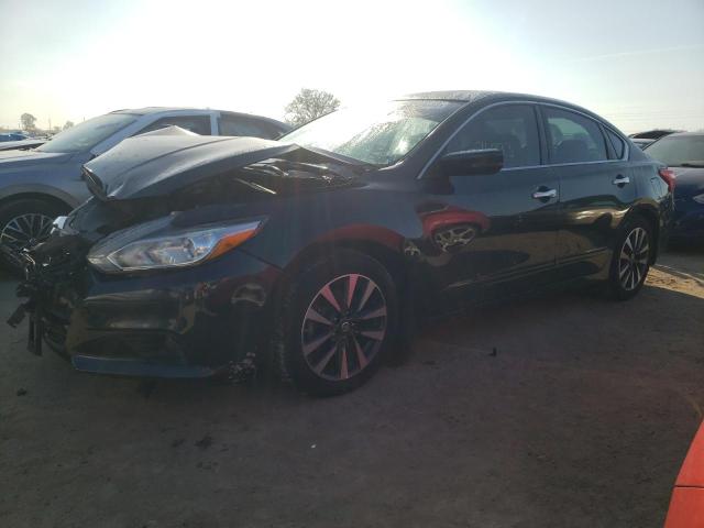 NISSAN ALTIMA 2.5 2017 with VIN 1N4AL3AP1HC197186 - Photo from auction