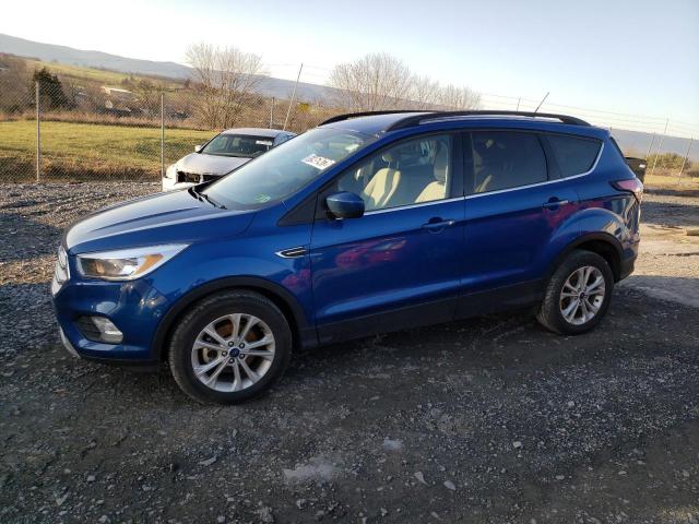 FORD ESCAPE SE 2018 with VIN 1FMCU0GD1JUD30939 - Photo from auction