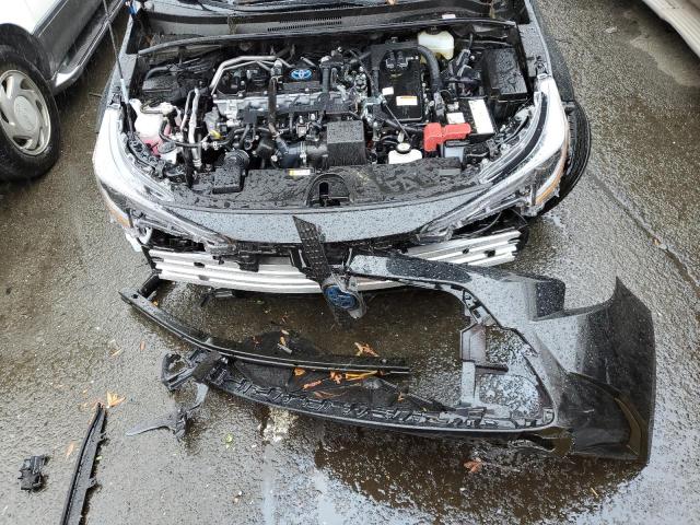 Photo 11 from auction – 2022 TOYOTA COROLLA LE with VIN JTDEAMDE7NJ047043