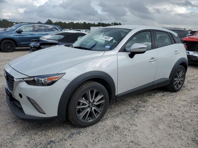 MAZDA CX-3 TOURI 2017 with VIN JM1DKDC70H0173556 - Photo from auction
