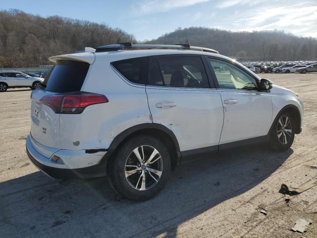 Photo 3 from auction – 2017 TOYOTA RAV4 XLE with VIN JTMRFREV0HD211346