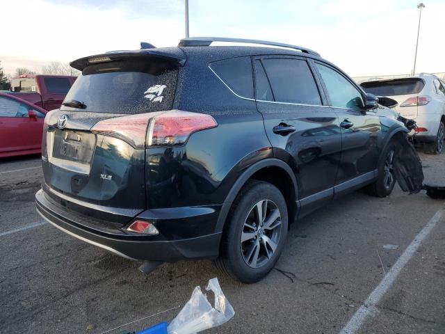 Photo 3 from auction – 2017 TOYOTA RAV4 XLE with VIN 2T3WFREV2HW393718